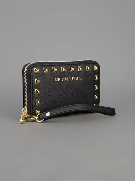 flat black michael kors wristlet|michael kors slim wallet black.